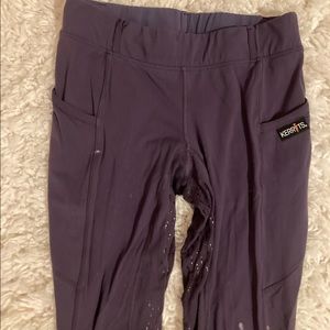 Kerrits Icefil Size M. Has some white paint stains that are noticeable on front.